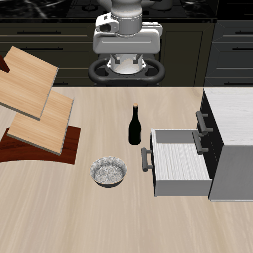 Put the black bowl in the bottom drawer